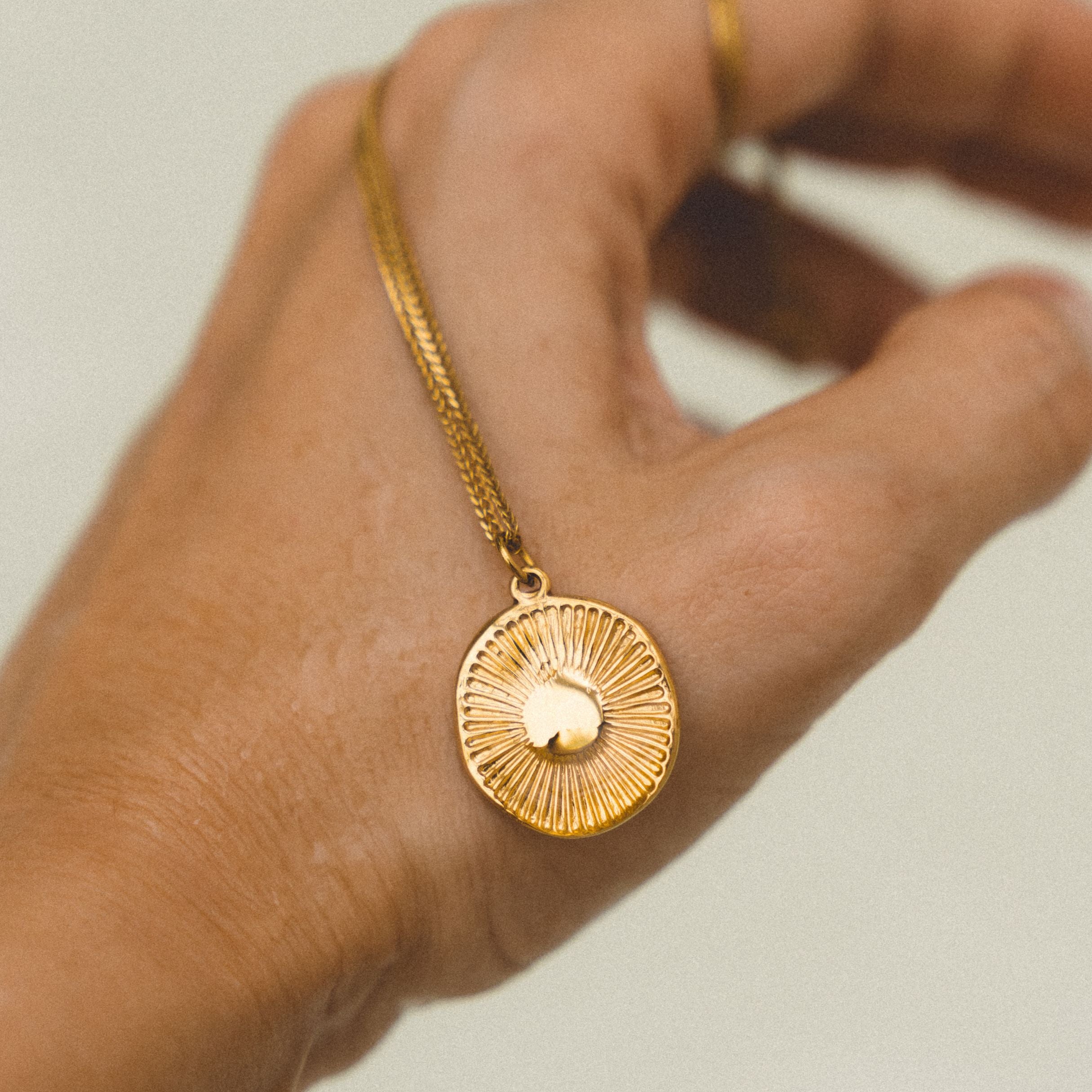 Ancient Coin Necklace Pendant In Hand