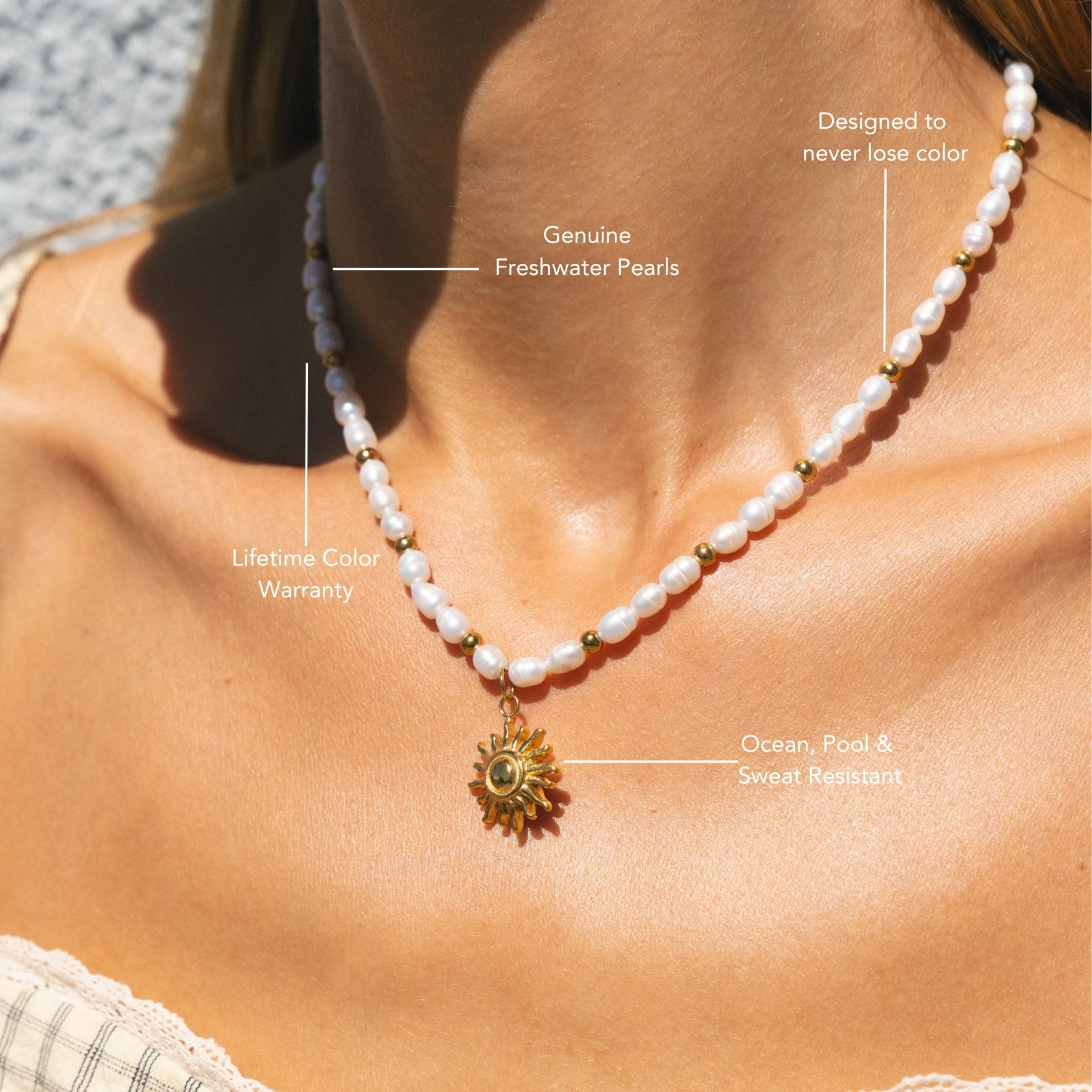 sun-pendant-gold-necklace-close-up