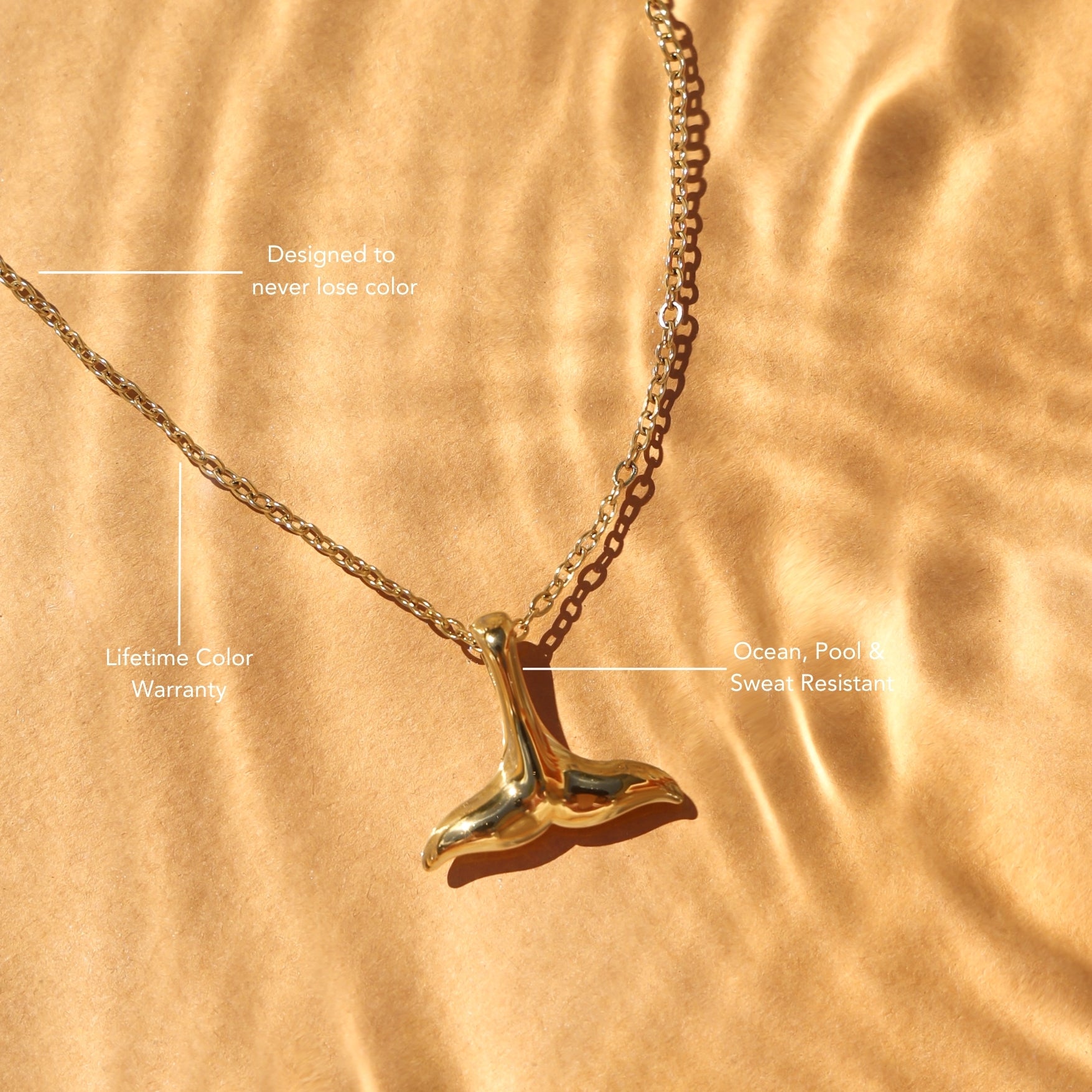 whale-tail-necklace-pendant-water-reflection
