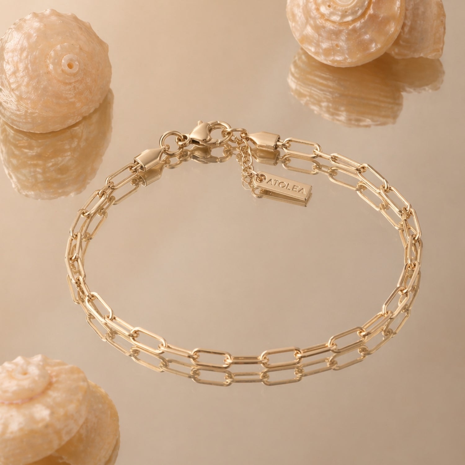 Cozumel 14k Gold Chain Bracelet Flat Lay With Shell Background, Waterproof Tarnish-Resistant Jewelry