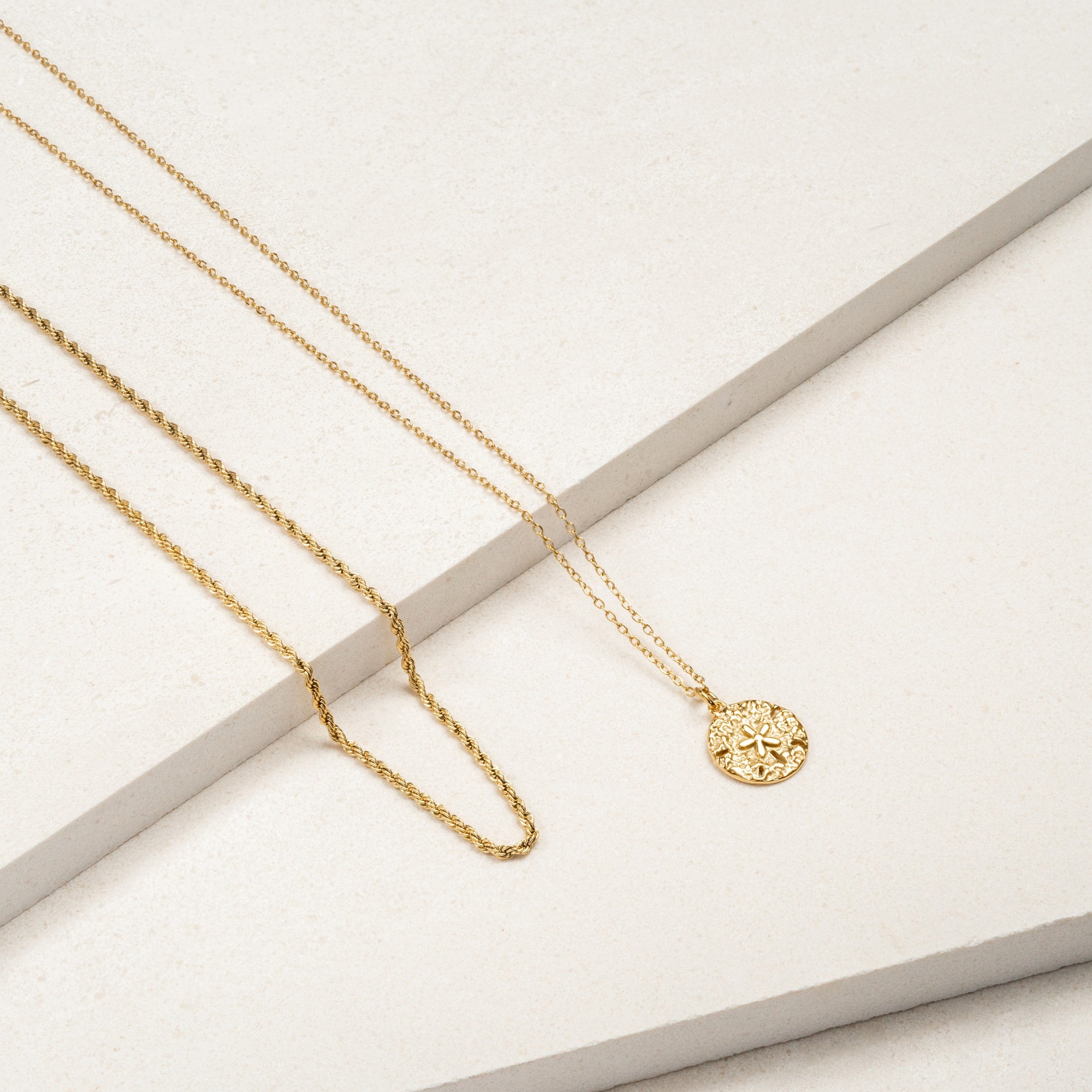 Sand Dollar Necklace Flat Lay